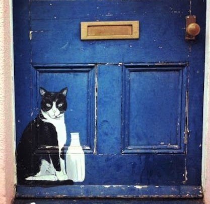 Chats peintures sur portes