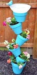 Les pots de fleurs encastrés au jardin