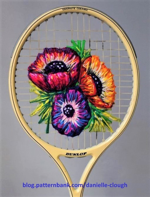 Superbes broderies sur raquettes de tennis Superbes broderies sur raquettes de tennis
