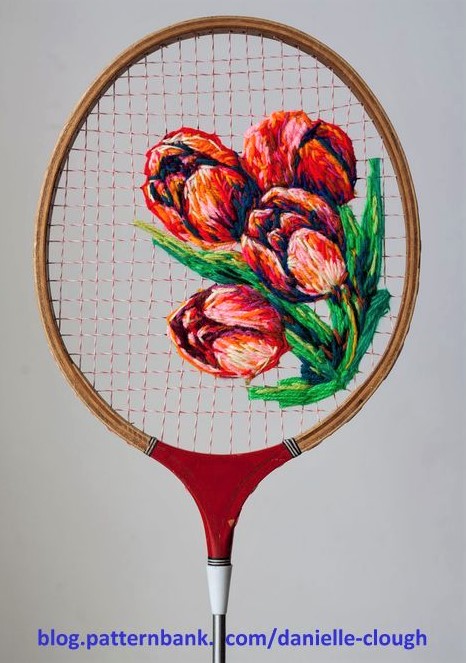 Superbes broderies sur raquettes de tennis Superbes broderies sur raquettes de tennis