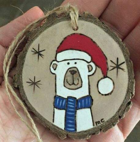 Décorations de Noël sur galettes de bois